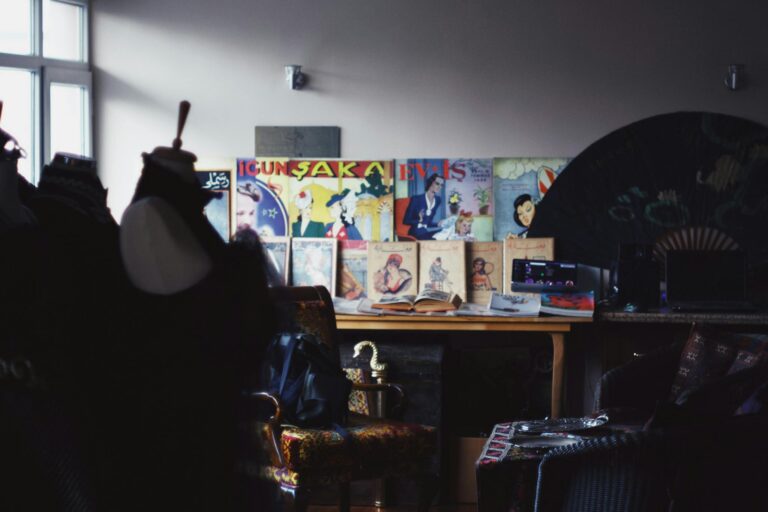 A room showcasing vintage Japanese art prints with warm light and creative ambiance.